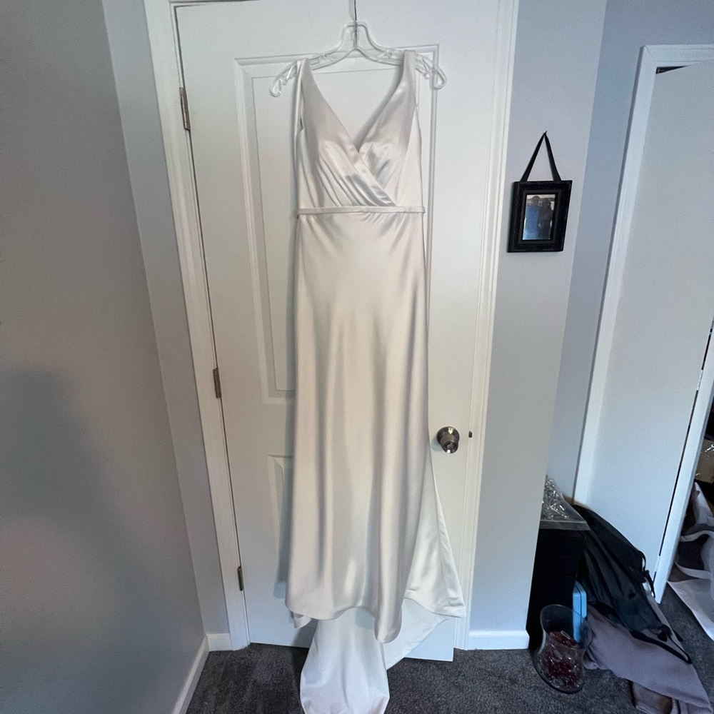 Never Altered wedding dress.  Can send any details necessary
